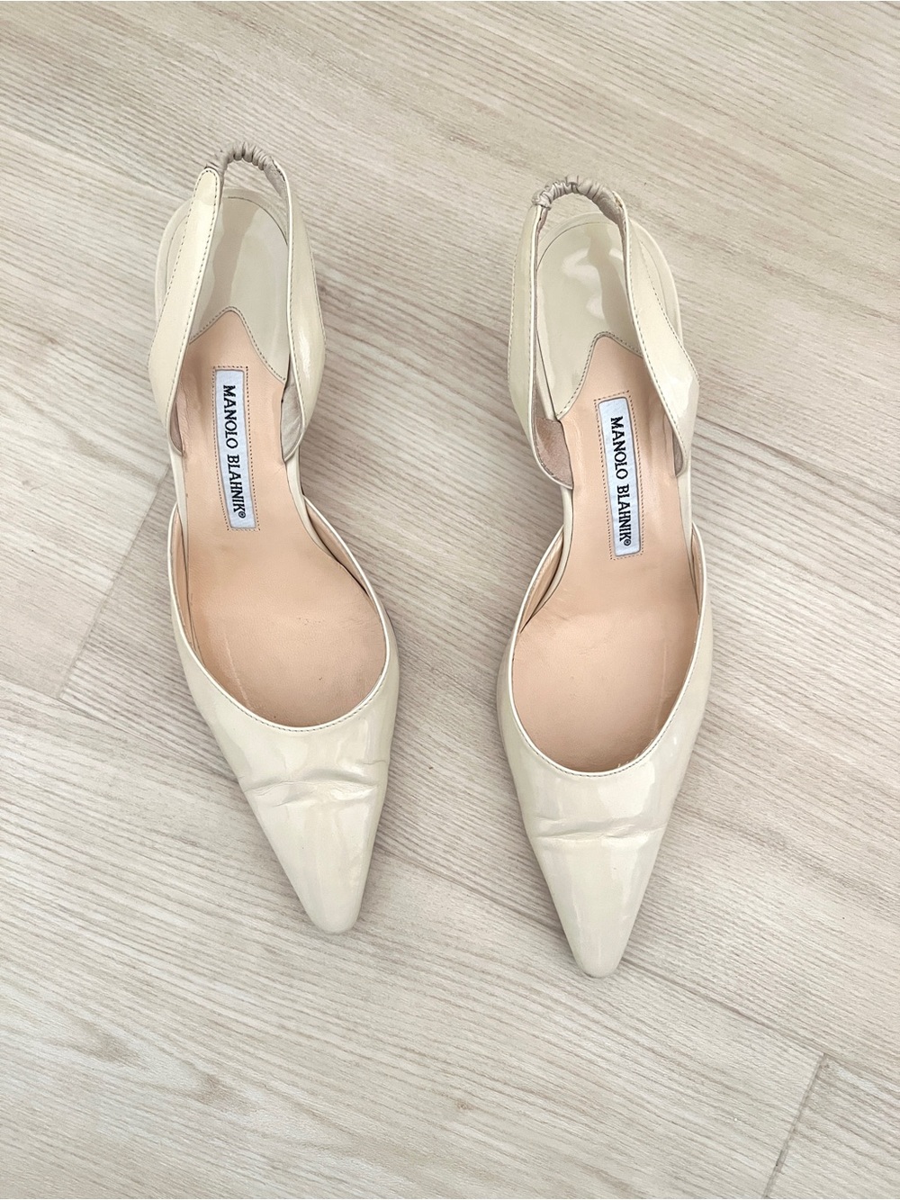 MANOLO BLAHNIK Carolyne 50mm pointy ivory slingback pumps / size 41.5